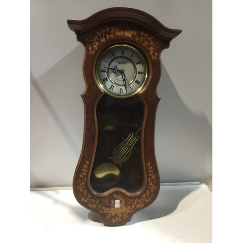 61 - Acctim wall mounted wooden clock with pendulum