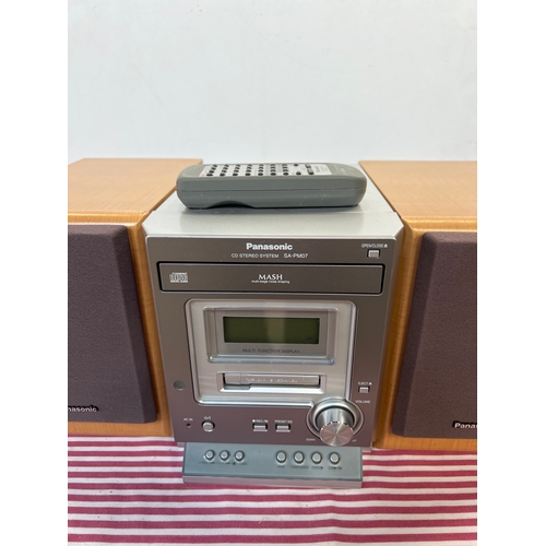 196 - Panasonic SA-PM07 hifi with speakers and remote - cd working, tape needs looking at