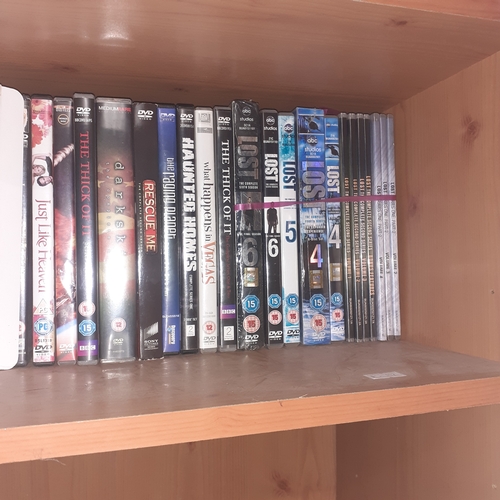 118A - Shelf of DVDs. Mixed genre and some complete series. All good condition