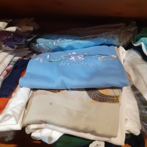 119A - Large quantity of TShirts. Most depict world wide destinations. Many look unworn and very good condi... 