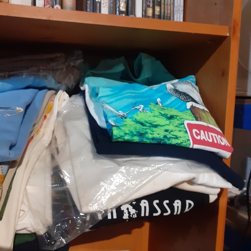 119A - Large quantity of TShirts. Most depict world wide destinations. Many look unworn and very good condi... 