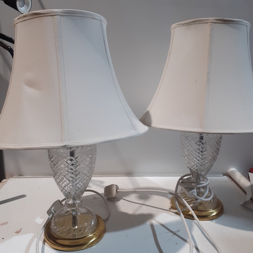 130A - Pair of Brass and Glass table lamps. Solid cut glass with brass finish. Great detail. Working