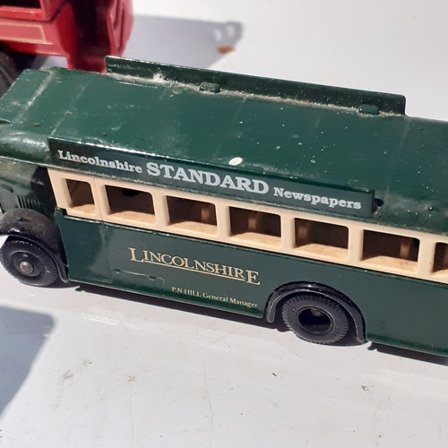 133A - Quantity of diecast buses and trams. Dusty but overall good condition.