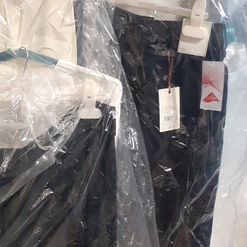 141A - Quantity of women's trousers. Sizes mainly around 18. Some new and others in very good, clean condit... 