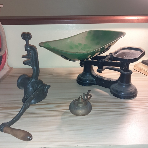 144A - Metal items. Cast iron weighing scales, vintage mincer and small Indian brass teapot.