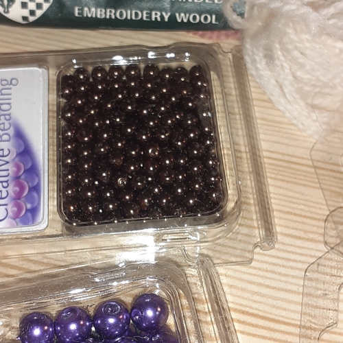 149B - Embroidery wool and craft beads. Stranded wool by Tilleys of London and several unopened packets of ... 