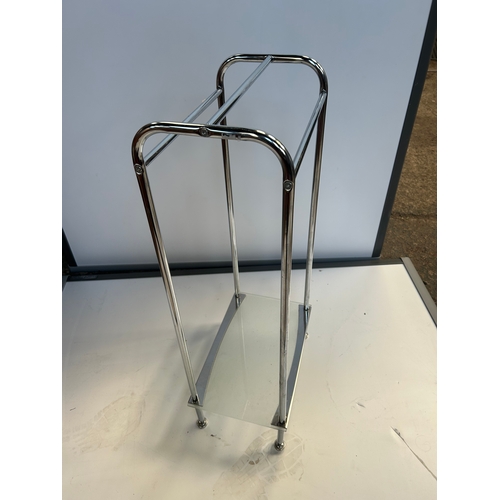 65 - Glass topped side table and towel holder