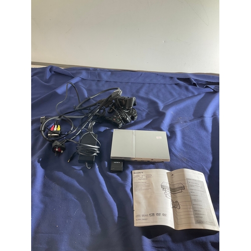 40 - Sony silver PS2 slim console with controllers and leads