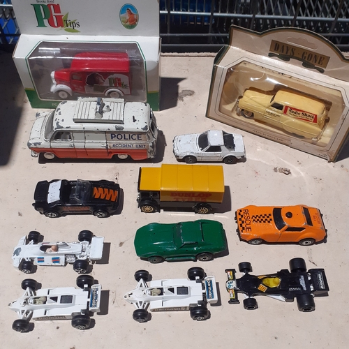 5 - Diecast lot. Includes Dinky Ford Transit Police Van, some Majorette Racing cars and other Matchbox e... 