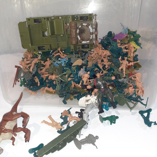 11 - Large quantity of mainly plastic soldiers.  Truck and dinosaur. Good condition