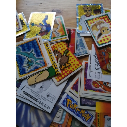 52B - Pokemon collection including cards and badges