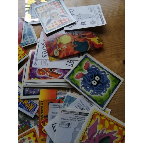 52B - Pokemon collection including cards and badges