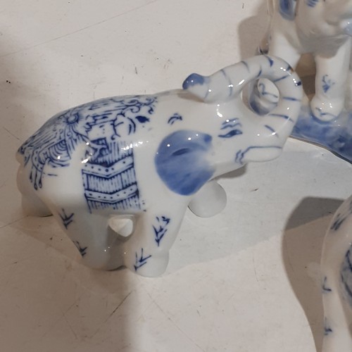 29 - Family of blue/white porcelain elephants. Great looking detail and no damage.