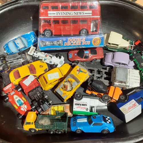 20 - Diecast lot including Red Double Decker Teamsters Bus unopened and other various cars and tricks on ... 