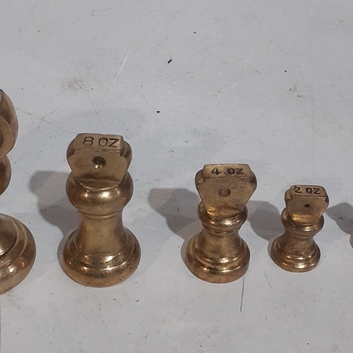 103A - Set of 7 imperial brass weights. Range from 2lb to 1/2 oz.