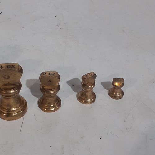 103A - Set of 7 imperial brass weights. Range from 2lb to 1/2 oz.