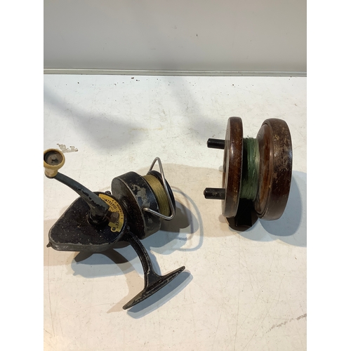 6 - Pair of vintage fishing reels one wooden with brass and 1 intrepid de luxe by k.p morritts