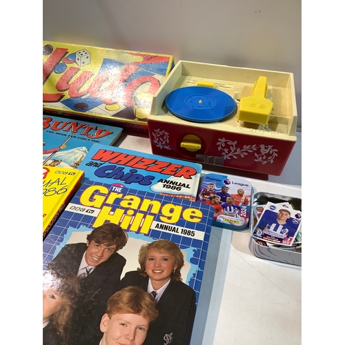 28 - Fisher price record player with records; Grange Hill annuals and more