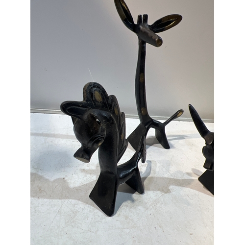 95 - Trio of ebonised brass sculptures