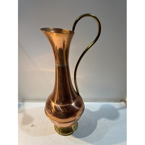 105 - Large copper and brass jug - approx 50cm tall