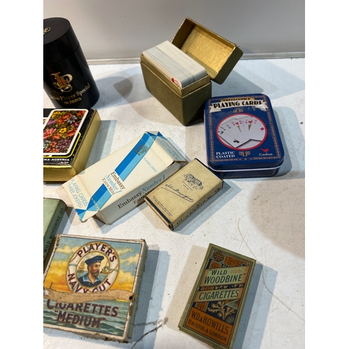 107 - Collectible lot inc playing cards, vintage cigarettes  & more