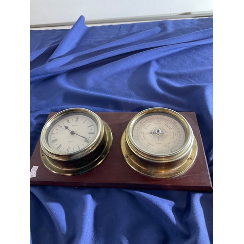 483 - Quartz  Metamec clock and barometer set on wooden plinth