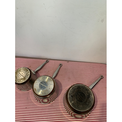 552 - Set of 3 copper based induction KitchenAid saucepans