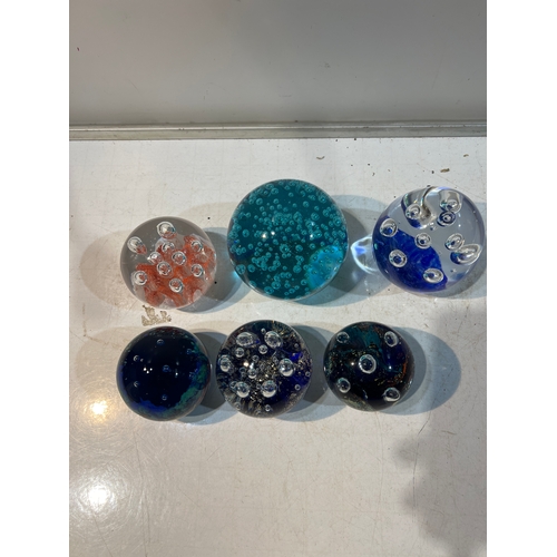 205 - 6x glass bubble effect paperweights in good condition