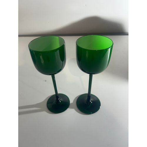 229 - Two Green and an Amber Glass Goblet