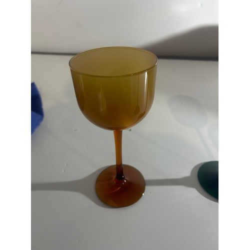 229 - Two Green and an Amber Glass Goblet