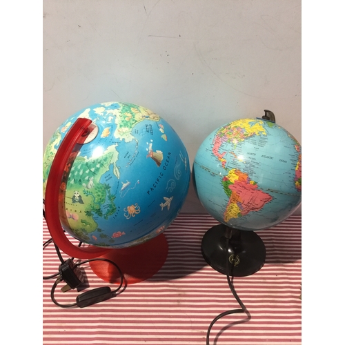 276 - Pair of globe lamps