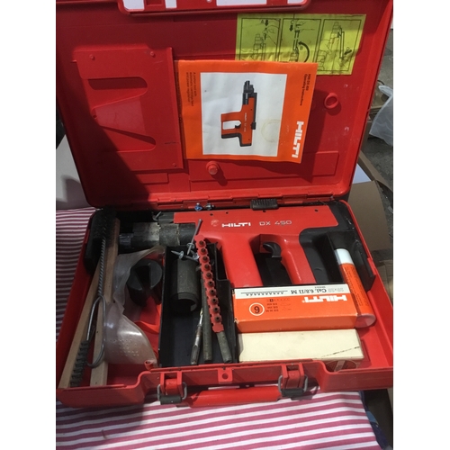 234 - Hilti DX 450 piston tool automatic cartridge feed plus  Cantilever tool box and contents