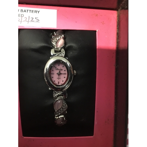 223 - Ladies Divinity watch with pink stoned strap new battery 10/2/25