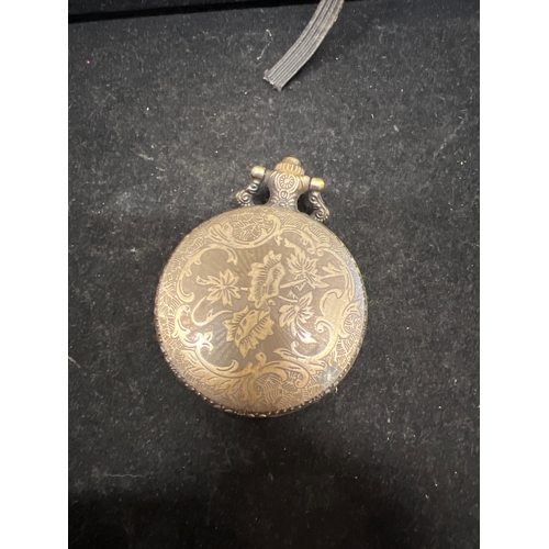 52 - Decorative pocket watch with motorbike decoration and quartz movement