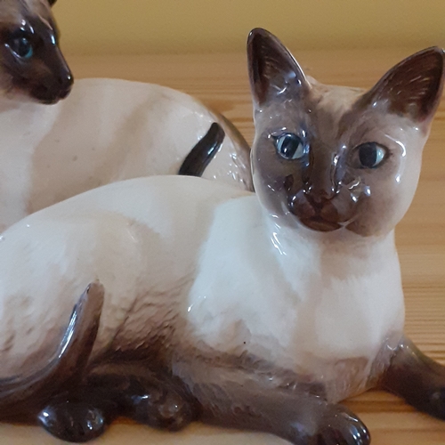 4 - Royal Doulton cat plus one other not marked Doulton but has number on underside 1559