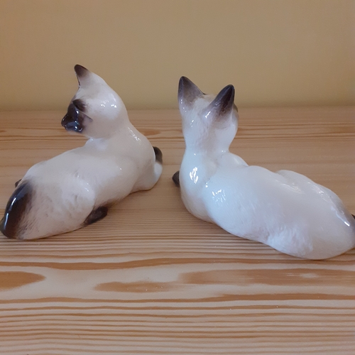 4 - Royal Doulton cat plus one other not marked Doulton but has number on underside 1559