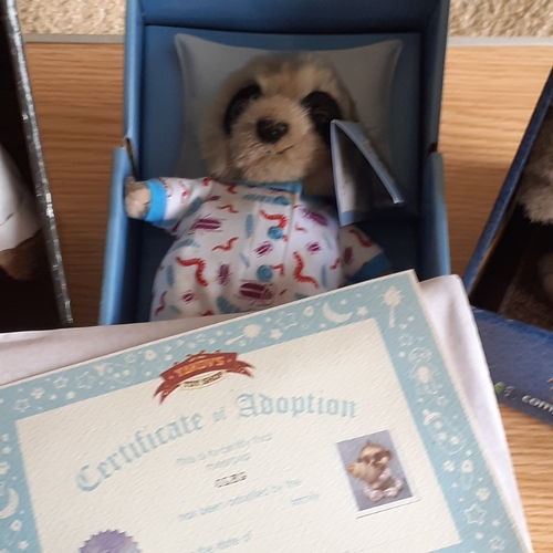 11 - 3 x Collectible Boxed Meercat toys. 2 have certificates.