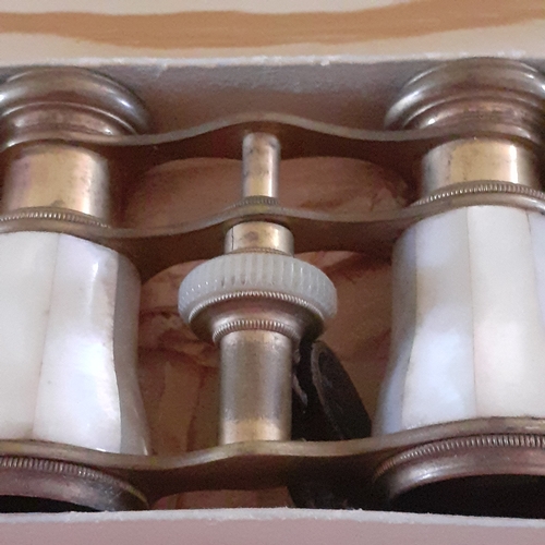 115B - Opera binoculars Colmont Paris. Great mother of pearl and brass detail. Nice example