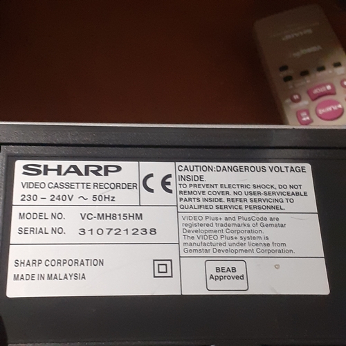 123A - Sharp Video Cassette Recorder with remote control. Model VC-MH815. Working order