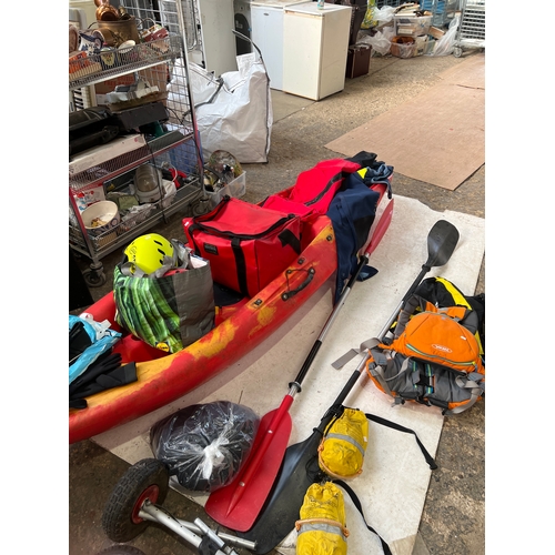 269 - 7ft kayak with cover, wheels, life jackets, helmets, oars and more