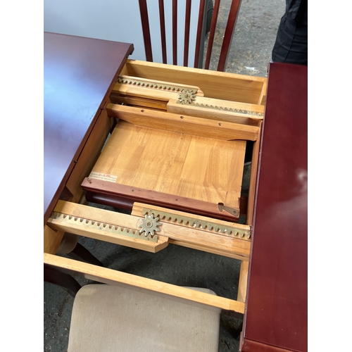 270 - Mahogany dining table - central leaf to extend - with 4 chairs - in very clean condition