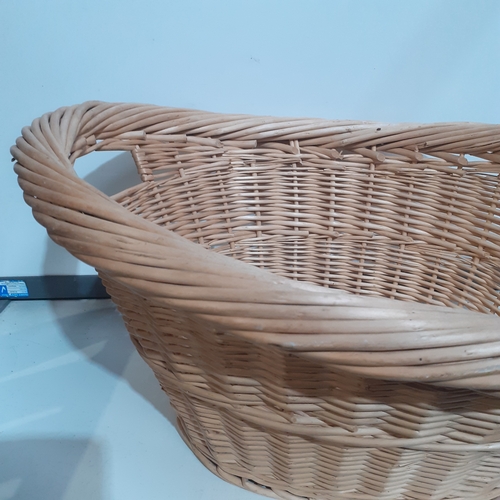 101A - Large wicker laundry basket. Approx 2ft by 18