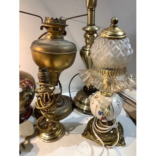 202 - Collection of lamps mainly brass style