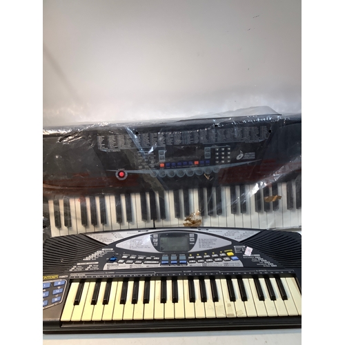 304 - 2 x electronic keyboards