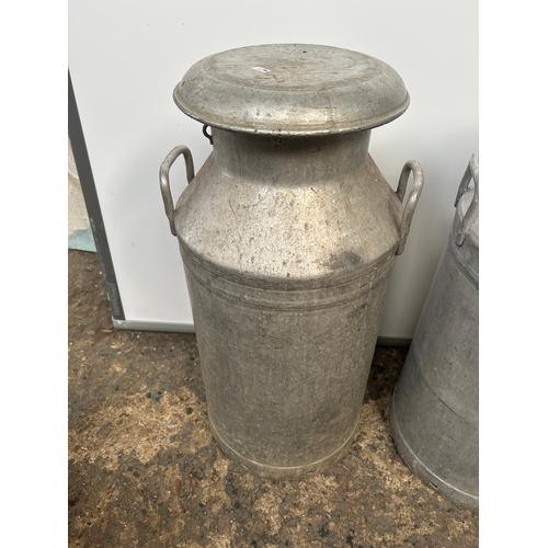 523 - Pair of Antique Aluminium Milk Churns in very good condition