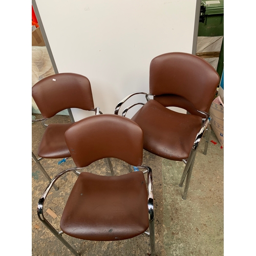 527 - Four Brown Faux Leather Chairs