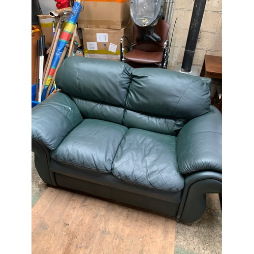 451 - Green Two-Seater Sofa in rather clean condition