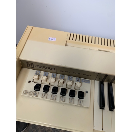 423 - Magnus Electric Chord Organ on plastic stand