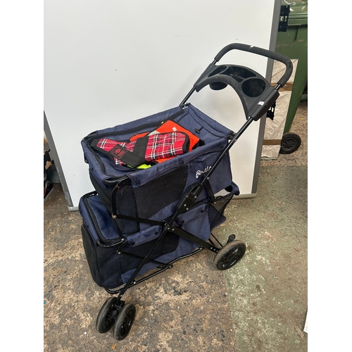 490 - Bell Two-Tier Dog Pram with a tartan and reflective dog coat