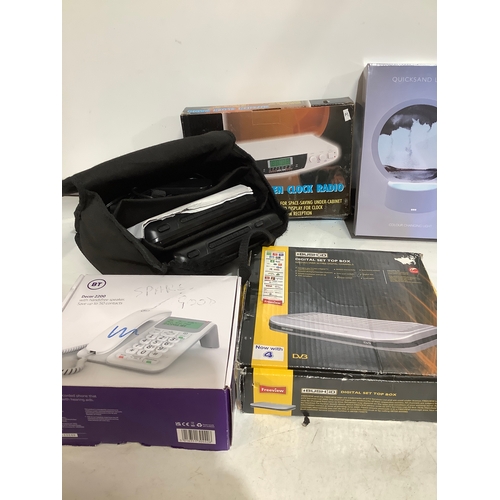 314 - Mixed lot but phone kitchen clock radio digital set top box in car two dvd player and more